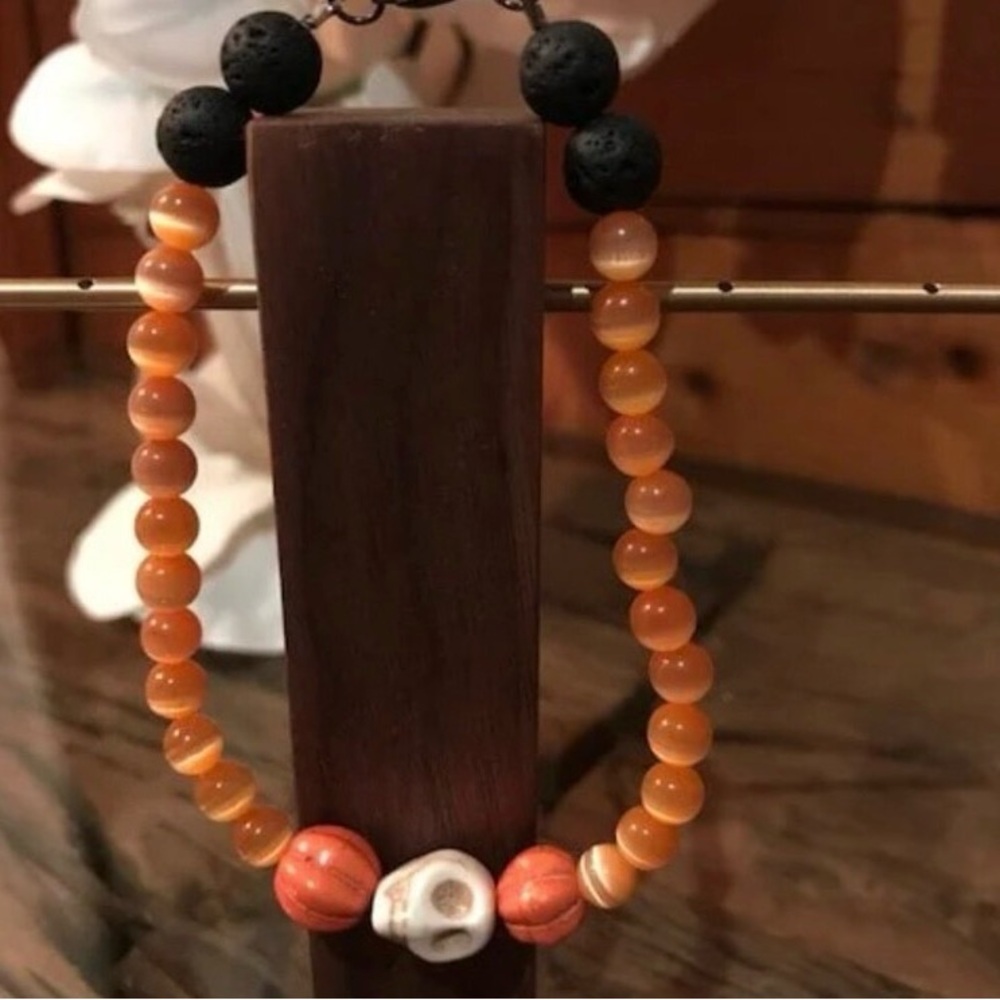 Orange Beaded Bracelet with Skull Accent